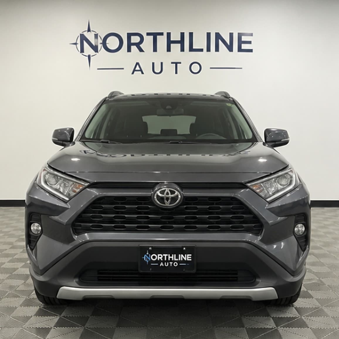 2020 Toyota RAV4 XLE AWD — front three-quarter view
