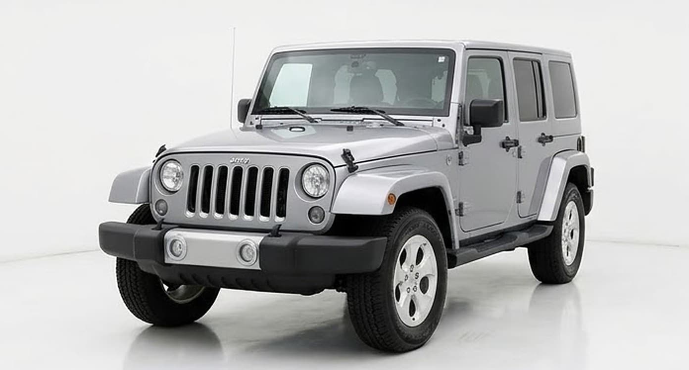 2016 Jeep Wrangler Unlimited Sahara — front three-quarter view